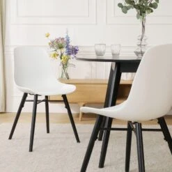 Nolon Nena-Pip Eetkamerstoel Wit - Zwarte Houten Poten -Meubelpromotie 889a7cdda02e4eb9adbba01ed7753187