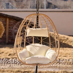 Hangstoel Van Bruin Rotan En Metaal -Meubelpromotie 993114053975470895572c4cb069b97a